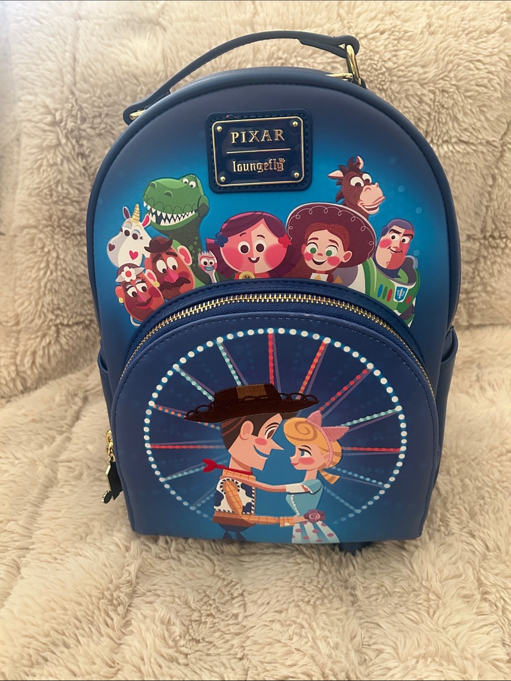 Loungefly Blue Pixar Toy Story Kids Mini Backpack with Character Carousel Art